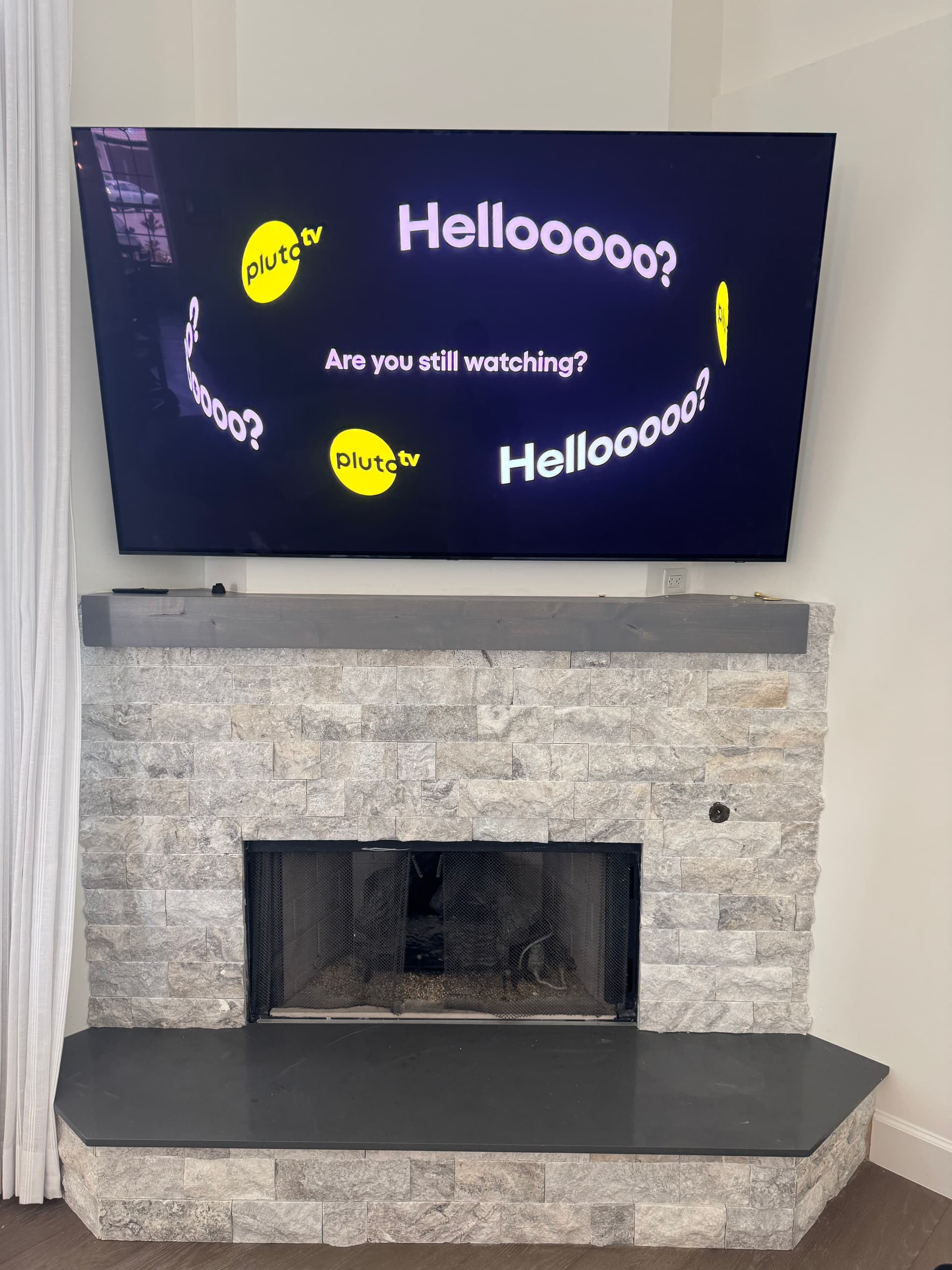 Above-fireplace mounting in Fort Lauderdale — heat, height, and geometry