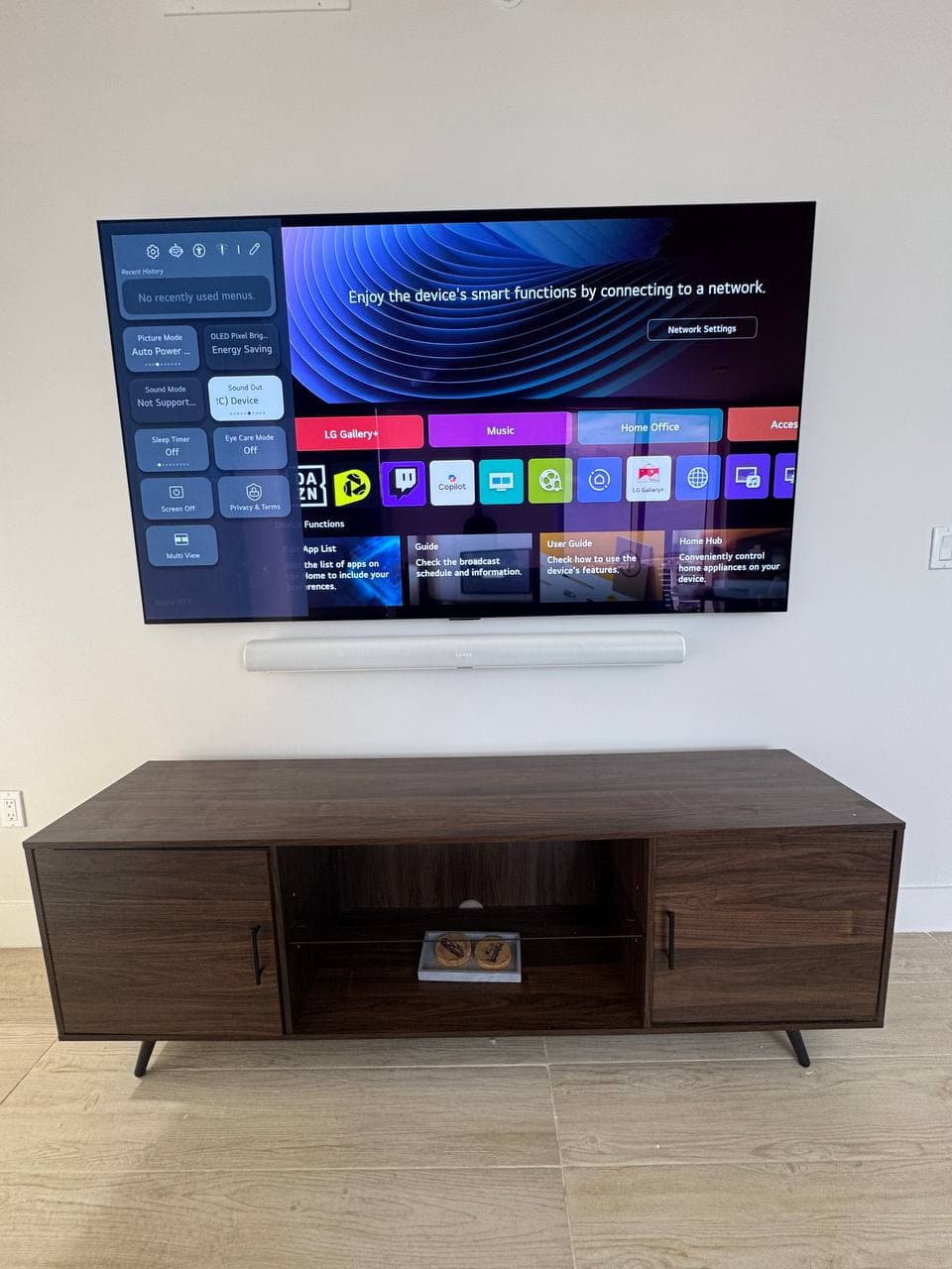 77" TV mount + soundbar install in Fort Lauderdale — every cable hidden inside the wall